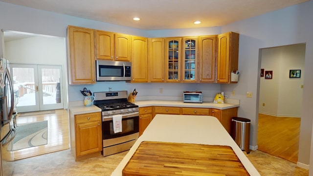 kitchen with appliances with stainless steel finishes and french doors