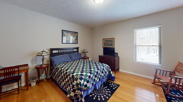 bedroom featuring wood-type flooring