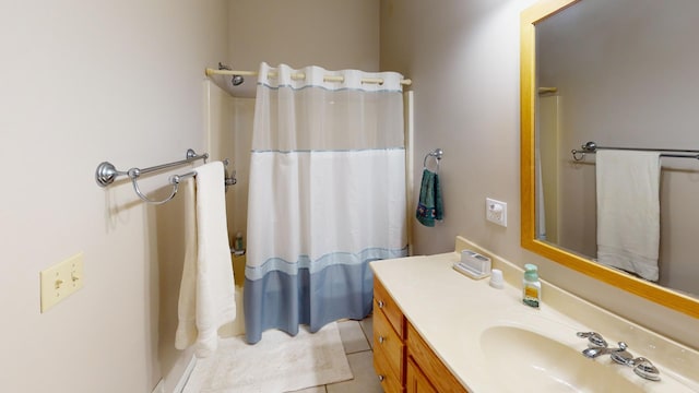 bathroom featuring tile patterned floors and vanity