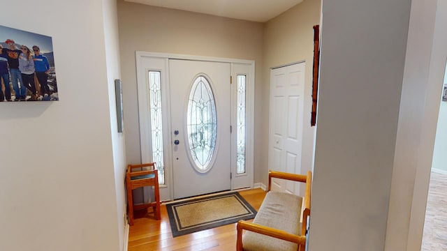 entryway with light hardwood / wood-style flooring