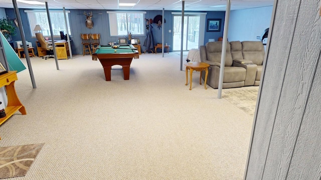 recreation room with a paneled ceiling, light carpet, and billiards