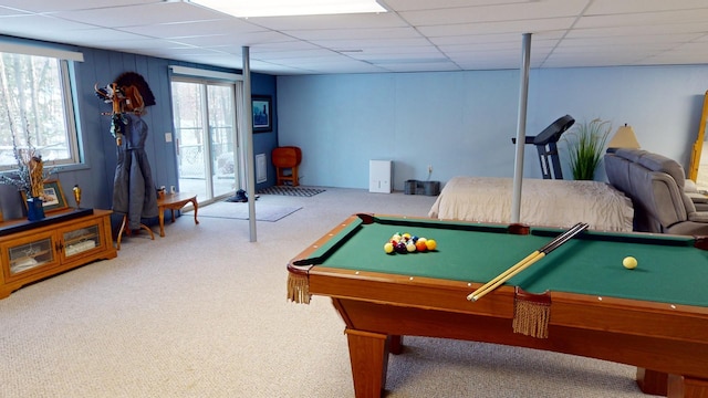 playroom featuring a drop ceiling and carpet flooring