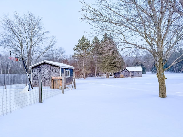 view of yard covered in snow