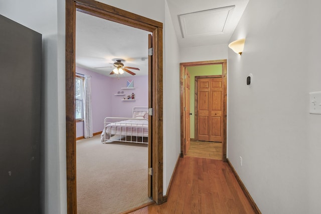 corridor featuring hardwood / wood-style flooring