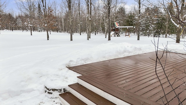 view of snow covered deck