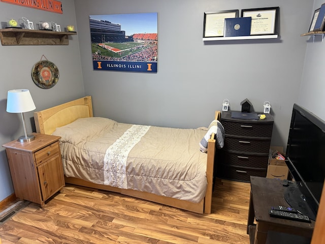 bedroom featuring light hardwood / wood-style flooring