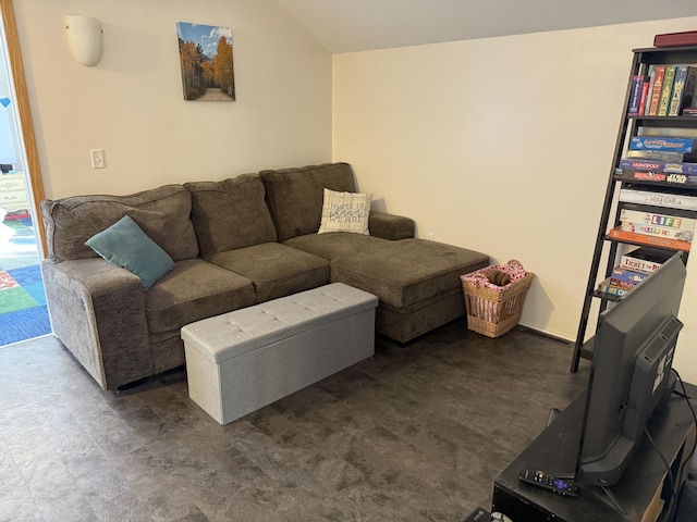 living room featuring vaulted ceiling