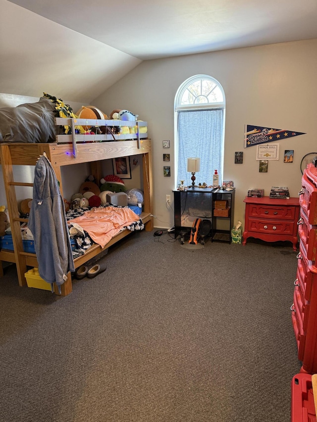 carpeted bedroom featuring vaulted ceiling