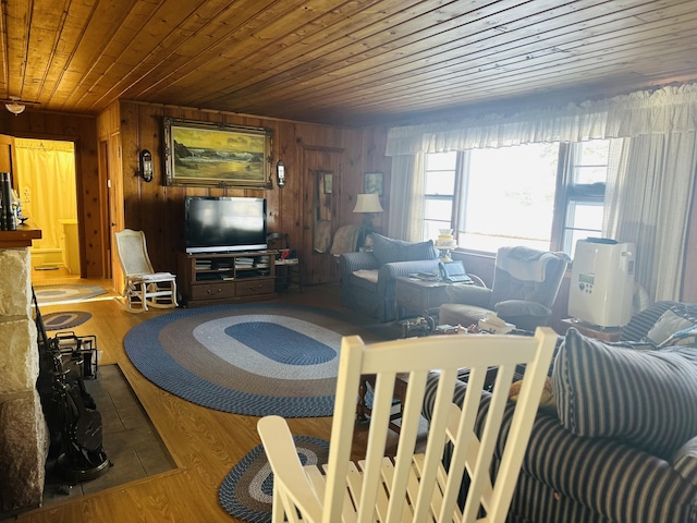 living room with wood ceiling, wood-type flooring, and wood walls