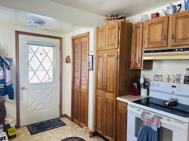 kitchen featuring white electric range oven