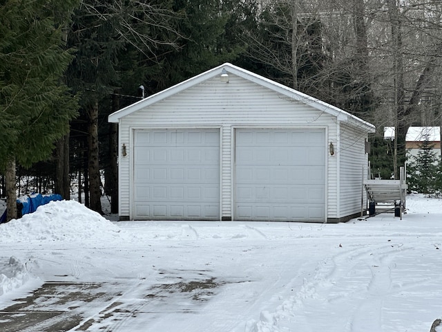 view of snow covered garage