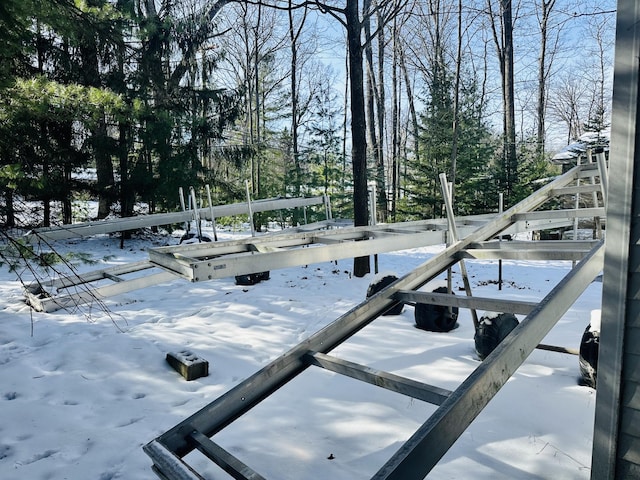 view of yard layered in snow