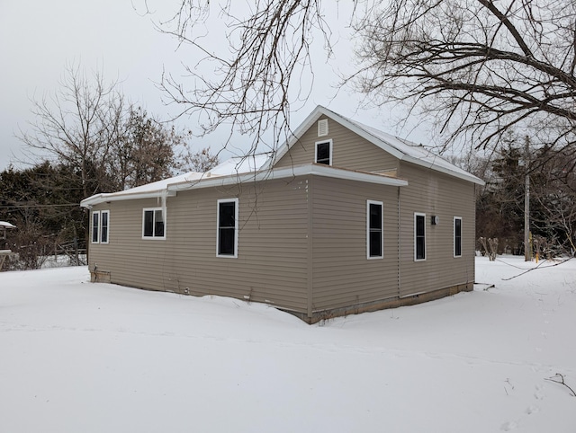 view of snow covered property