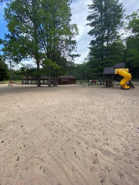 view of property's community featuring a playground