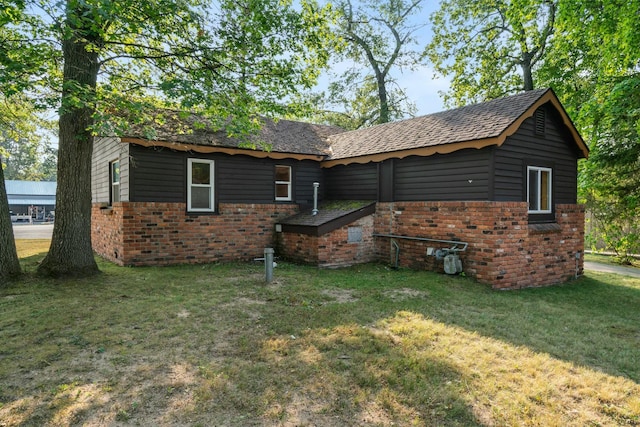 view of home's exterior featuring a yard