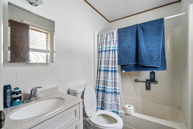 full bathroom featuring lofted ceiling, crown molding, shower / tub combo, vanity, and toilet