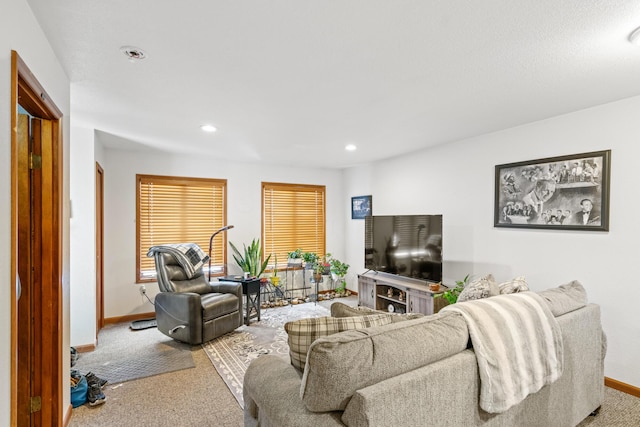 living room featuring light carpet