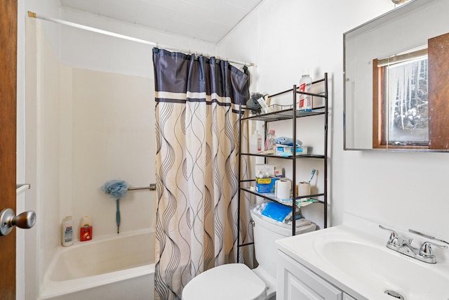 full bathroom featuring vanity, toilet, and shower / bathtub combination with curtain