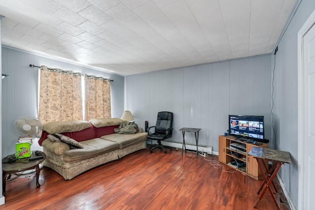 living room with hardwood / wood-style flooring and a baseboard radiator