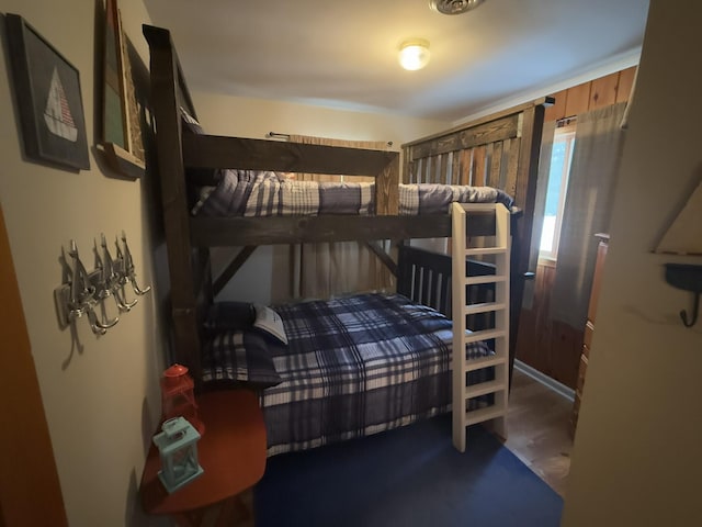 bedroom featuring hardwood / wood-style flooring