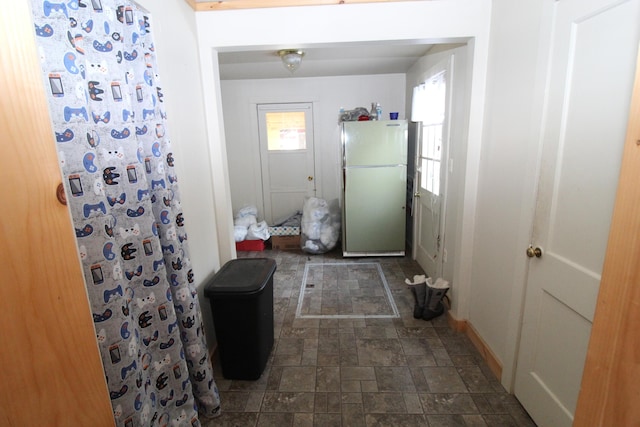 bathroom featuring a shower with curtain