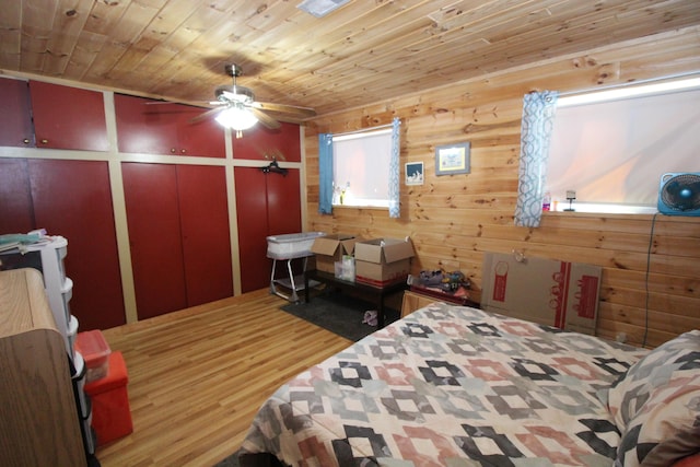 bedroom featuring wood ceiling and hardwood / wood-style flooring