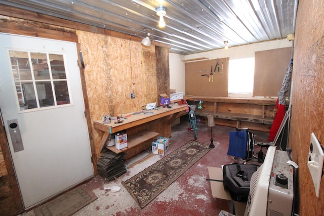 basement with a workshop area