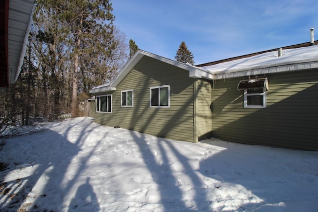 view of snow covered property