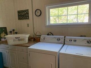 washroom with separate washer and dryer