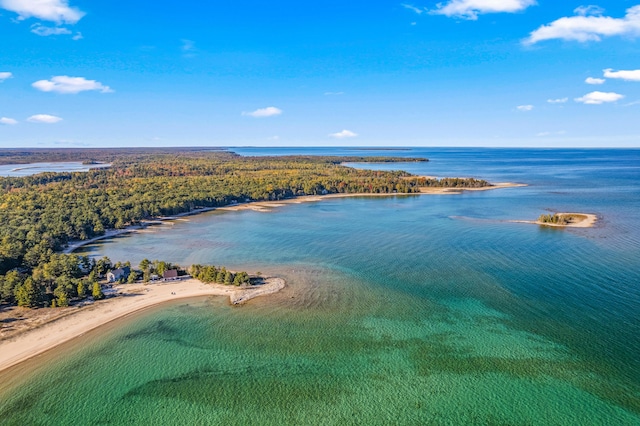 aerial view featuring a view of the beach and a water view