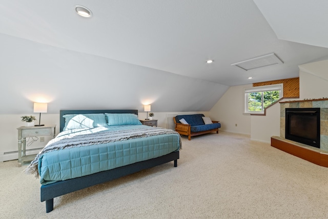 bedroom featuring lofted ceiling, a fireplace, and baseboard heating