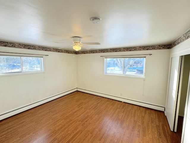 empty room with wood-type flooring