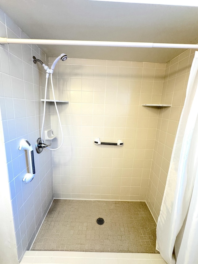 bathroom with a shower with curtain