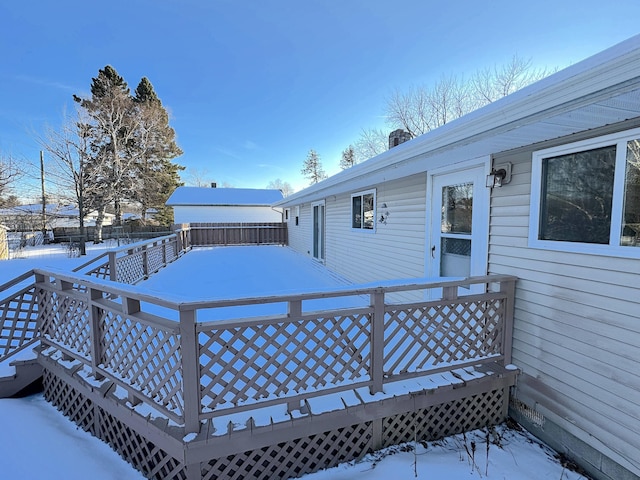 view of snow covered deck