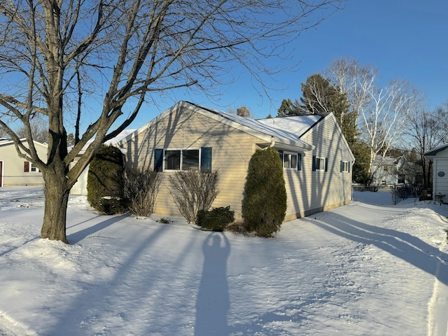 view of snow covered property