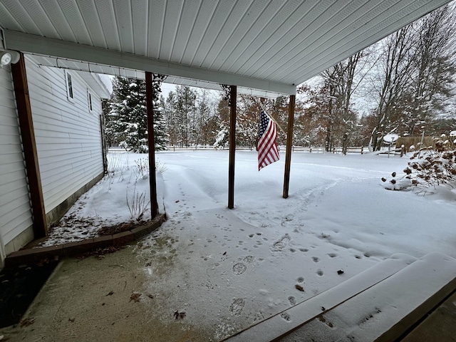 view of yard covered in snow