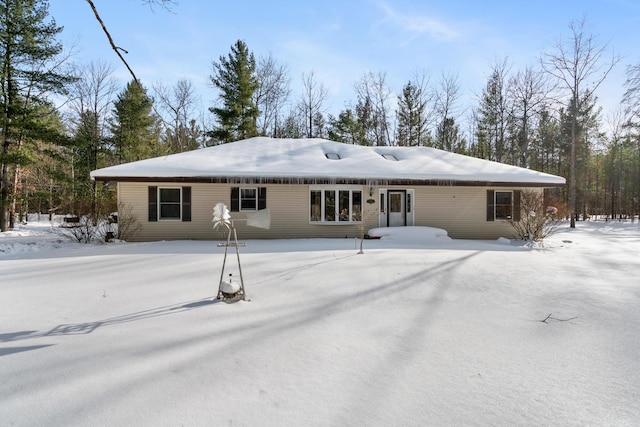 view of snow covered property