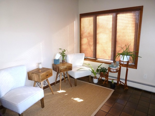 sitting room with dark tile patterned floors