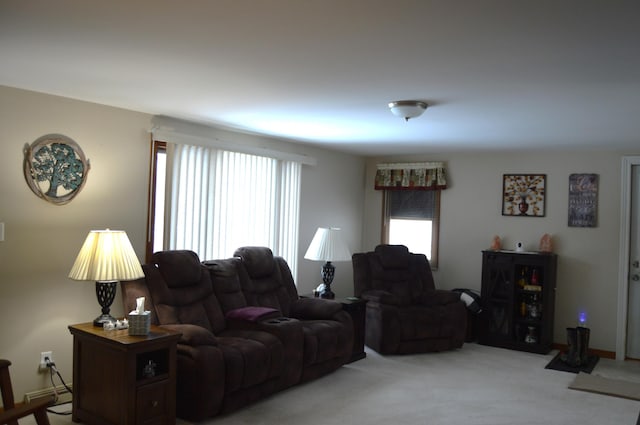 living room featuring light carpet