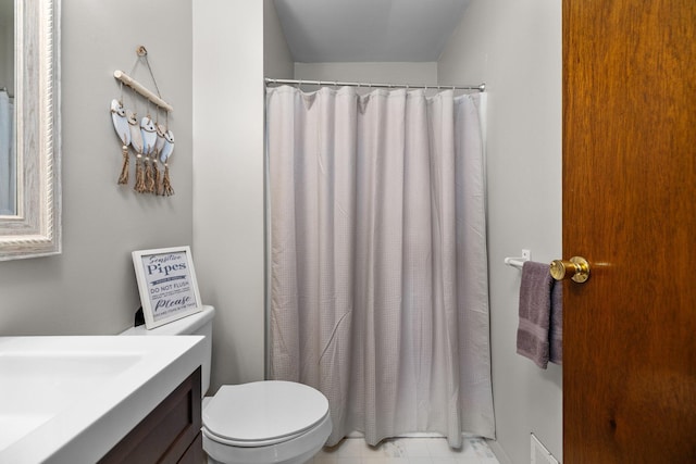 bathroom with toilet and sink