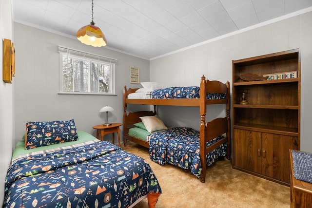 carpeted bedroom with crown molding