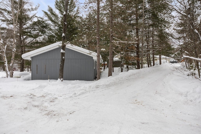 view of snow covered garage