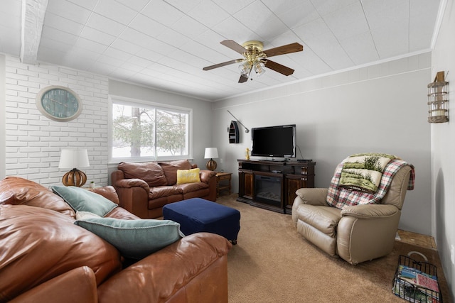 living room with crown molding, light carpet, and ceiling fan