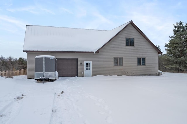 exterior space with a garage