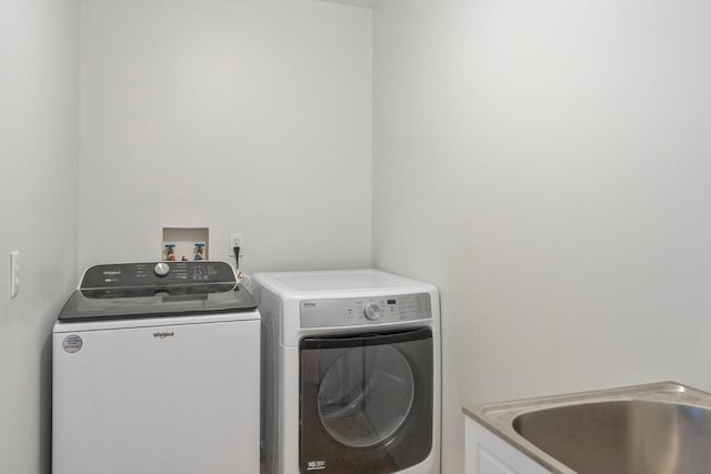 laundry area featuring independent washer and dryer