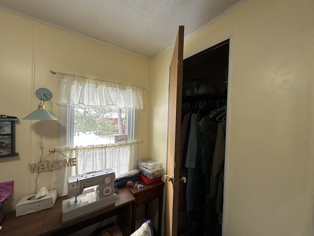 office area with a textured ceiling