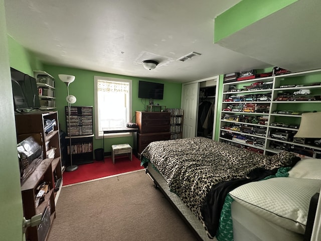 carpeted bedroom featuring a closet