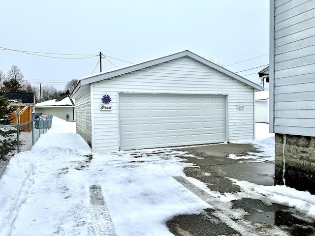 view of snow covered garage