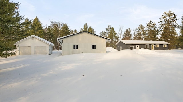 view of front of home with an outbuilding and a garage