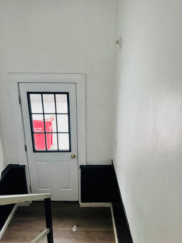 entryway with hardwood / wood-style flooring